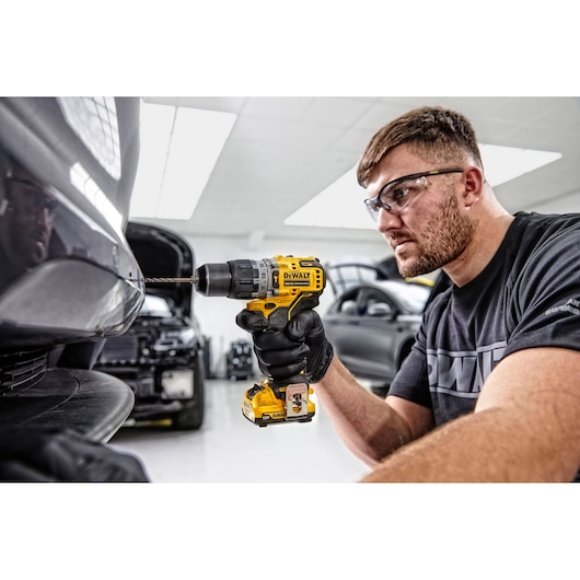 Perceuse visseuse Percussion XR 12V 2Ah Li-Ion Brushless - coffret TSTAK Perceuse visseuse Percussion XR 12V 2Ah Li-Ion Brushless - coffret TSTAK