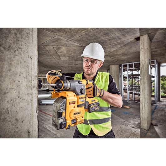 54V FlexVolt Brushless SDS Hammer Drill and Dust Extractor drilling concrete wall