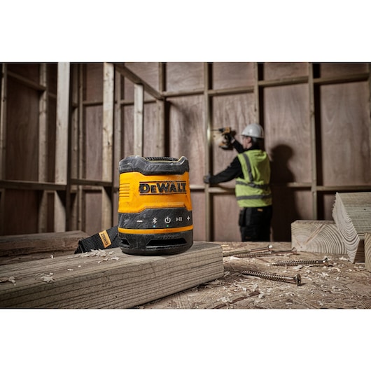 Rechargable USB Bluetooth speaker being used on worksite