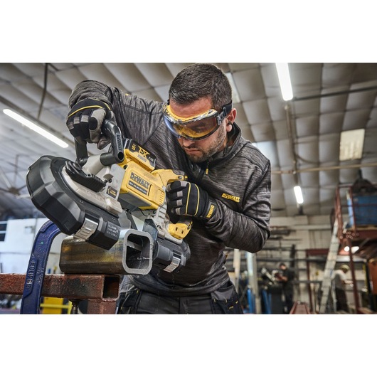 DEWALT 18V XR Brushless Deep Cut Band Saw cutting steel box