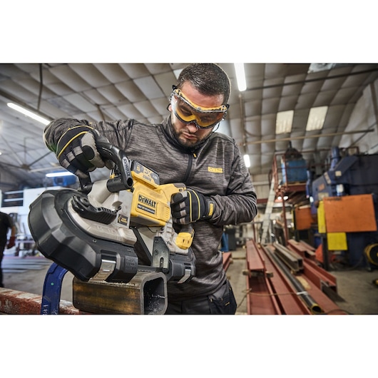 DEWALT 18V XR Brushless Deep Cut Band Saw cutting steel box