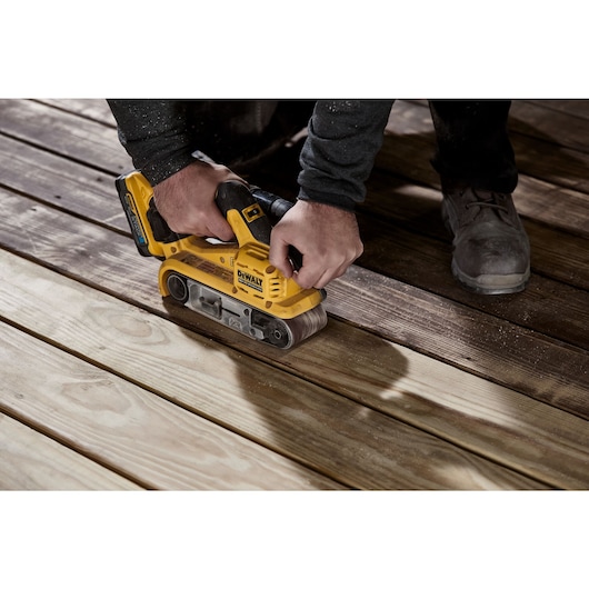 18V XR Brushless Belt Sander sanding floor board