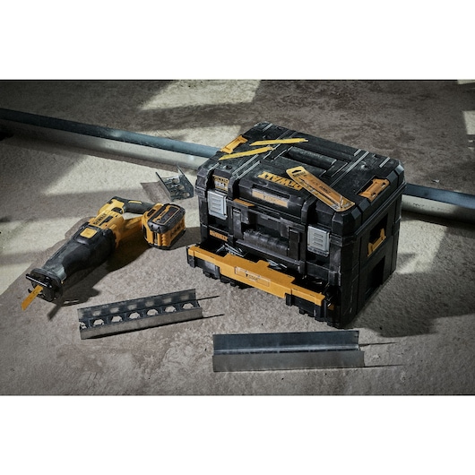 Reciprocating saw blades on top of a Tstak which sits alongside a reciprocating saw and metal off-cuts Reciprocating saw blades on top of a Tstak which sits alongside a reciprocating saw and metal off-cuts