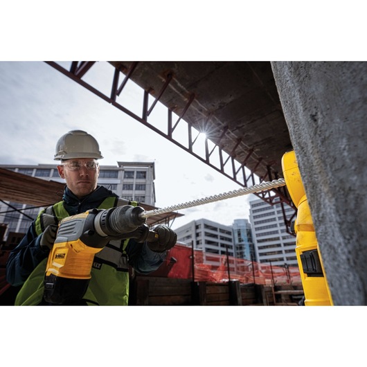 Elite Series Bit drilling into concrete wall Elite Series Bit drilling into concrete wall