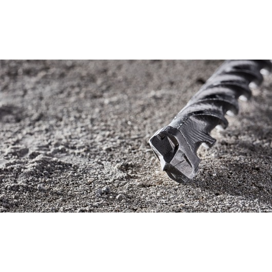 Elite Series Bit on angle on concrete close up of tip Elite Series Bit on angle on concrete close up of tip