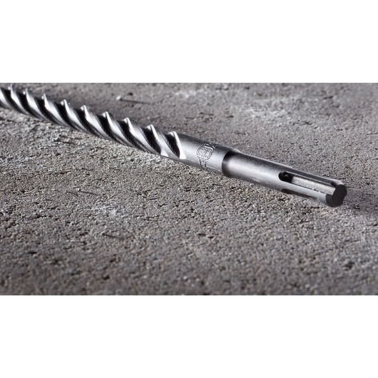 Elite Series Bit on angle on concrete close up of SDS fitment Elite Series Bit on angle on concrete close up of SDS fitment
