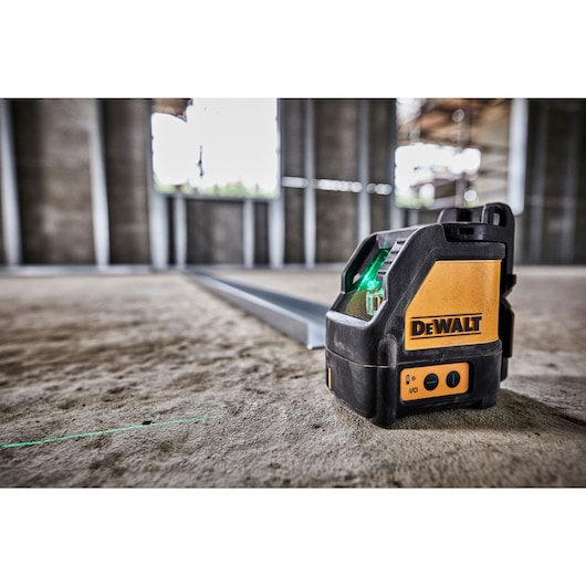 Green cross line laser being used at a constuction site.