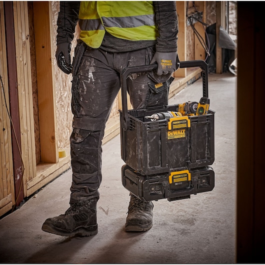 TOUGHSYSTEM 2.0 Cordless Adjustable Work Light and Storage open with tools being carried on job site