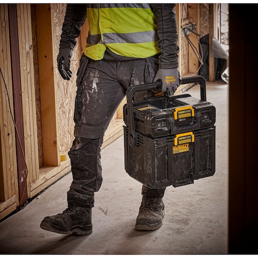 TOUGHSYSTEM 2.0 Cordless Adjustable Work Light and Storage closed being carried on job site