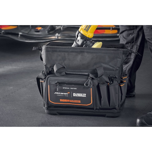 DEWALT McLaren tool bag with multiple pockets for storing tools, designed for heavy-duty work.